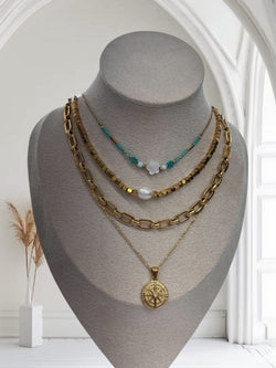 Collar de acero inoxidable con brújula